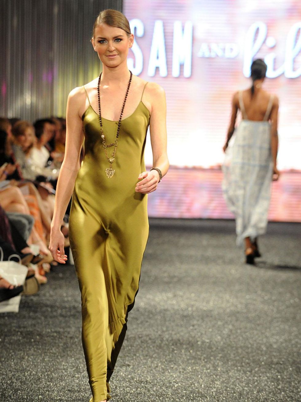 Models on the runway at West Ave Fashion on the Avenue March 2014