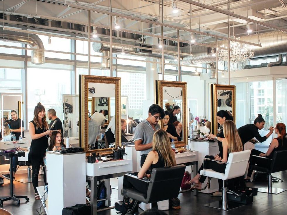 models prep for shows at Fashion X Houston