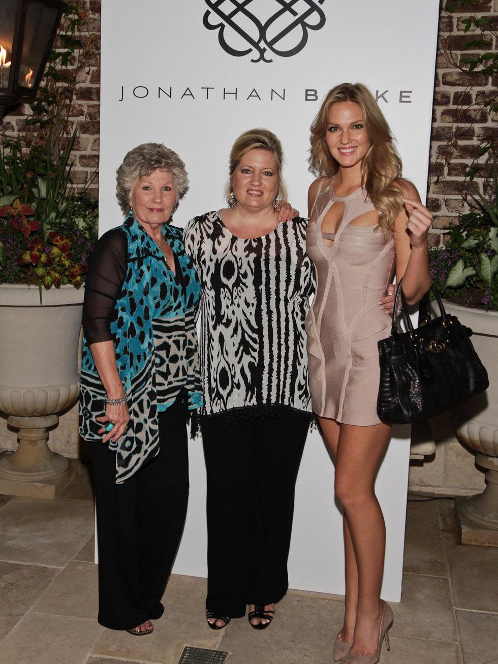 mom, from left, grandmother and Brittany Booker at the Jonathan Blake Fashion Show October 2013