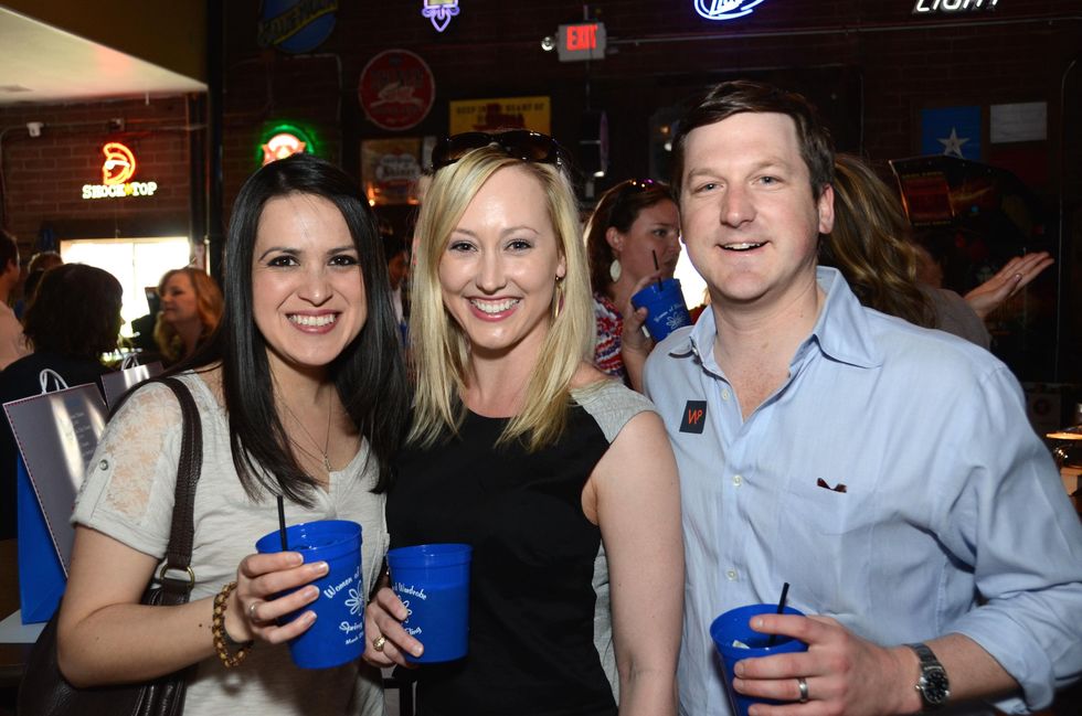 Monica Petrie, from left, Katie Chachere and Preston Kamin at the Women of Wardrobe Spring Fling March 2014