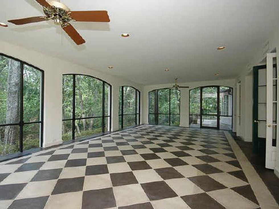 most expensive rentals Houston 3800 Willowick back patio with black-and-white tile