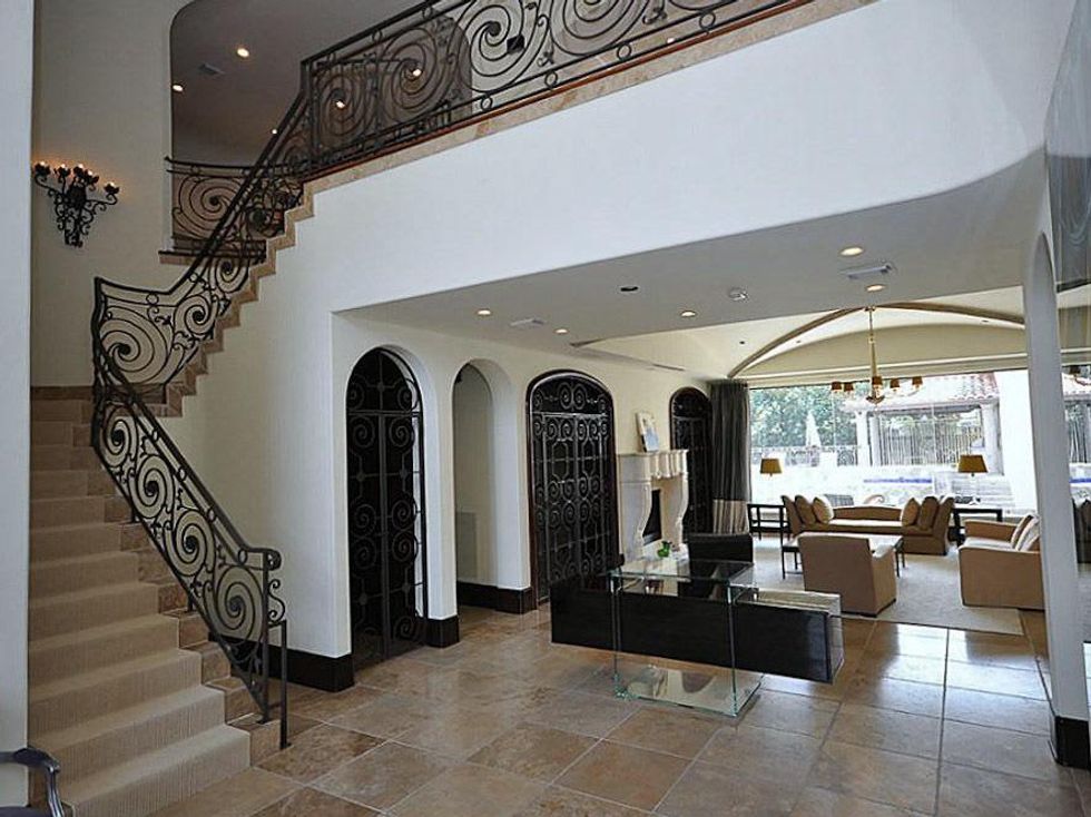 most expensive rentals Houston 5315 Doliver Drive family room and stairwell