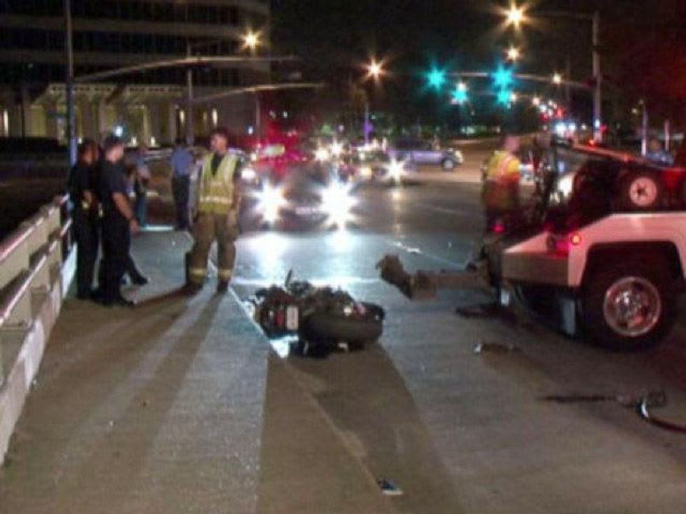 motorcyclist jumps curb along Allen Parkway June 2013 RUN FLAT