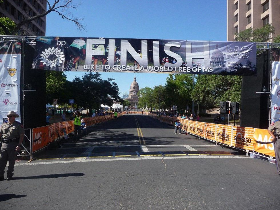 MS 150 bike race finish line in Austin with capitol in background