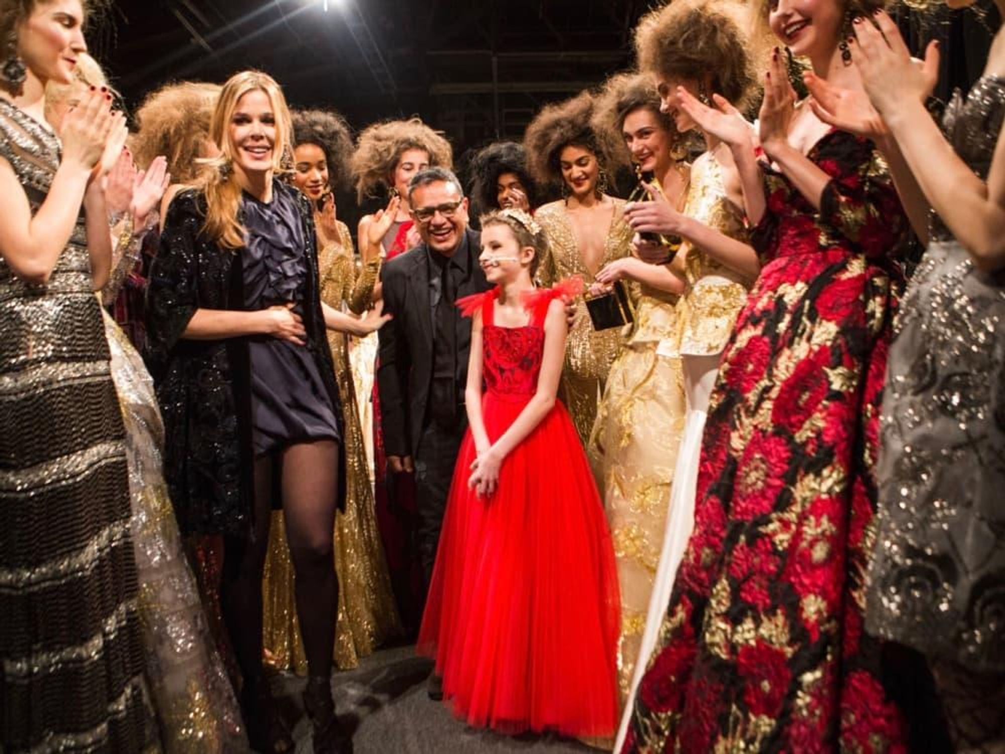 Naeem Khan and Trinity Faith Moran at runway show
