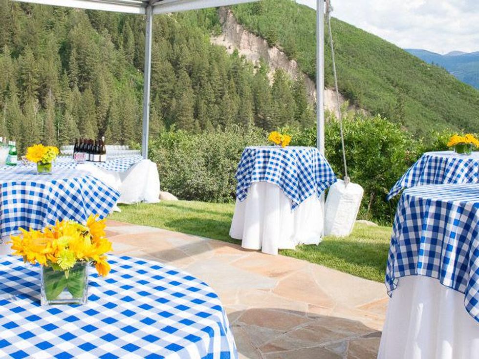 Nature Conservancy in Aspen July 2013 tables set outside with mountain view