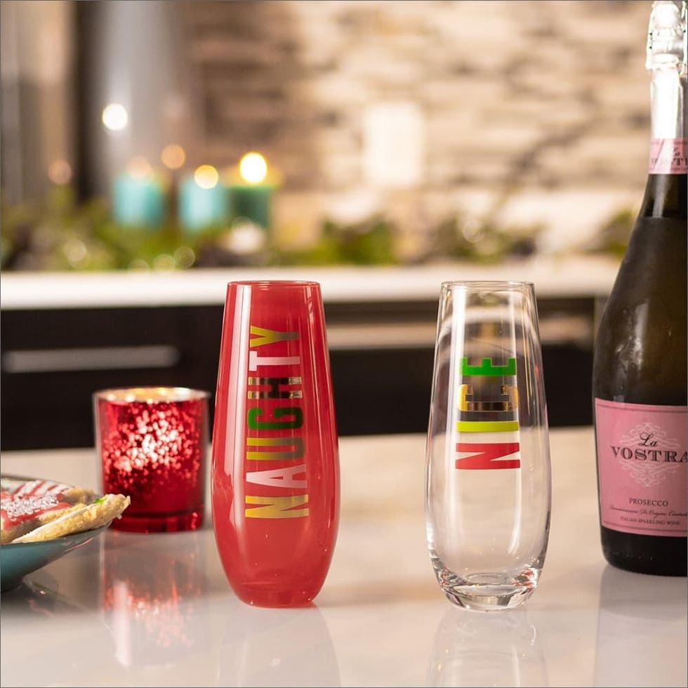 Naughty and nice glasses with sparkling wine