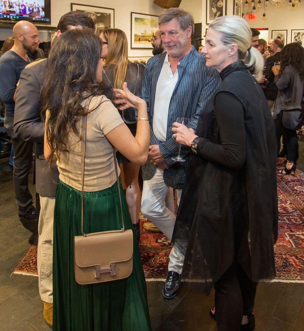 Neal Hamil and Holly Moore at John Varvatos book signing