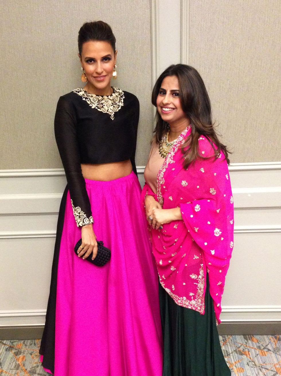 Neha Dhupia, left, and Ruchi Mukherjee at the South Asian Chamber Gala February 2014