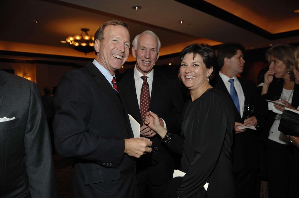 Neil Bush, from left, with R.C. and Nel Slocum at the George Bush Presidential Library Foundation dinner December 2013