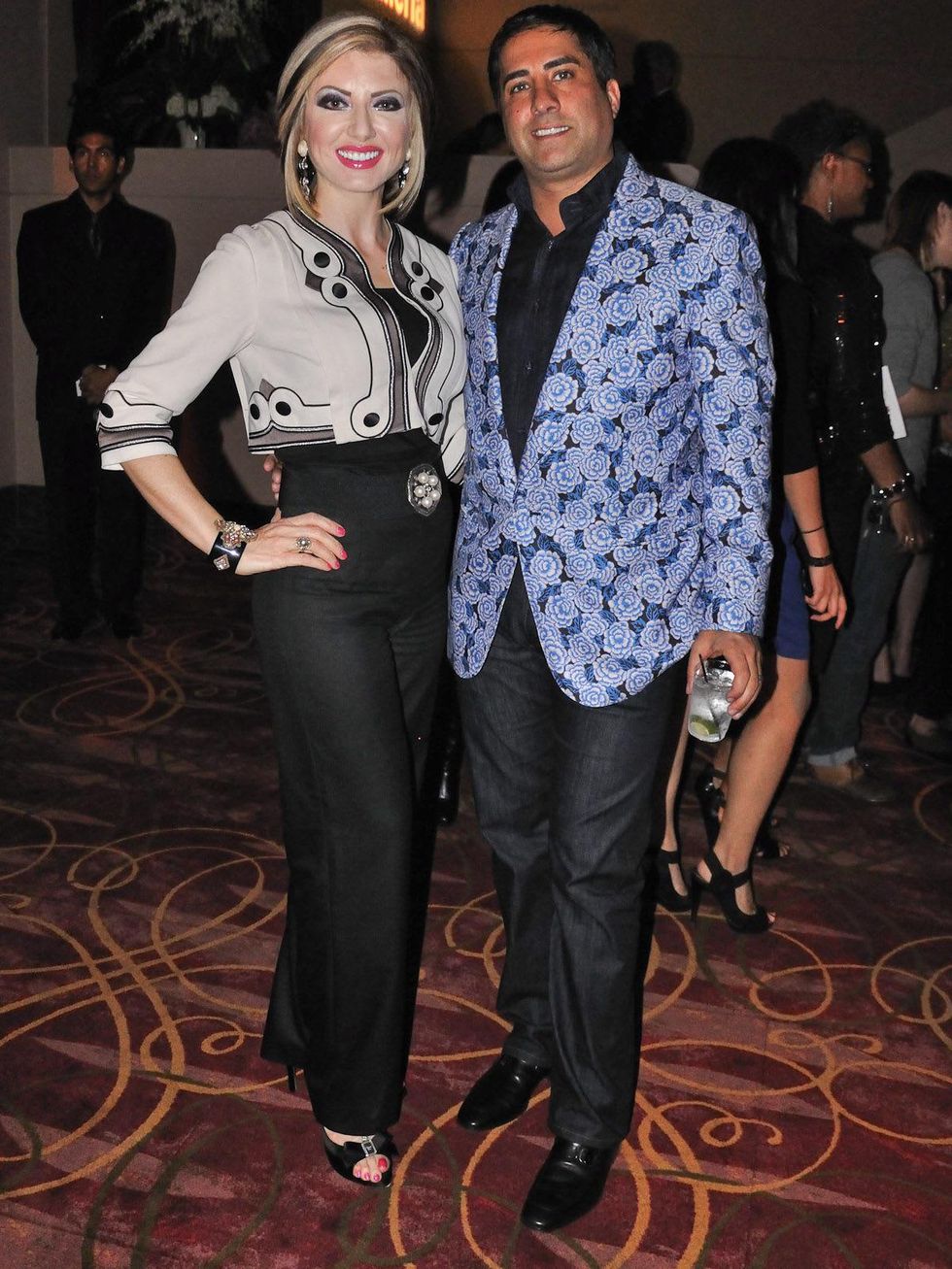 News_010_Fashion Houston_Day Four_Faces in the Crowd_October 2011_Yasmine Haddad wearing Temperley London and Andy Aweida wearing Tom Ford