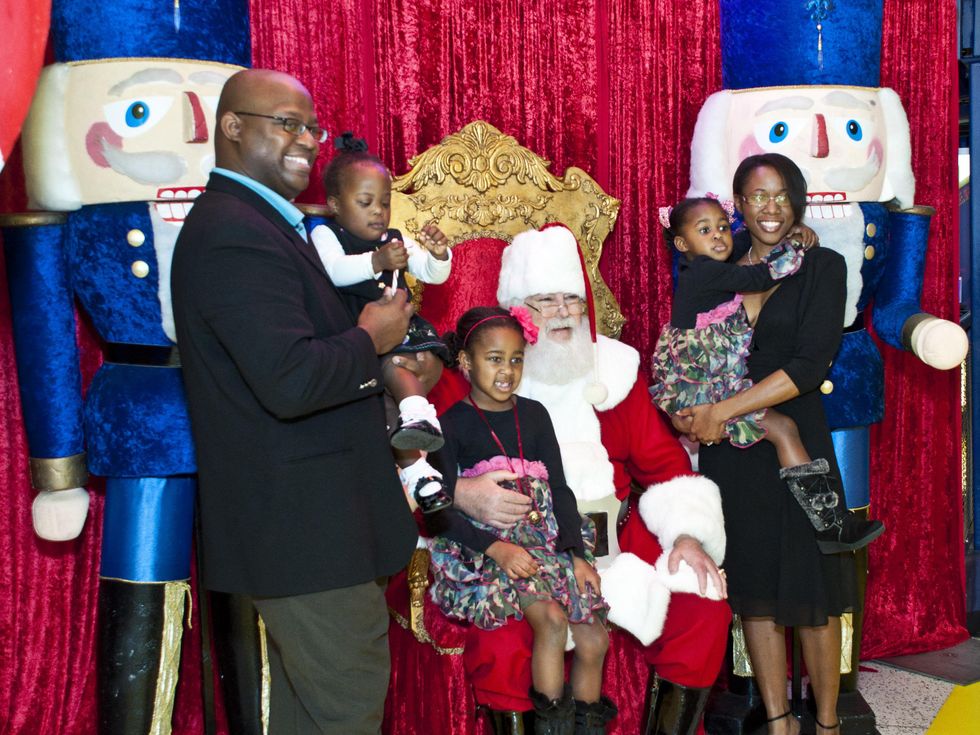 News_Gingerbread House Party_December 2011_The Logan Family_Santa