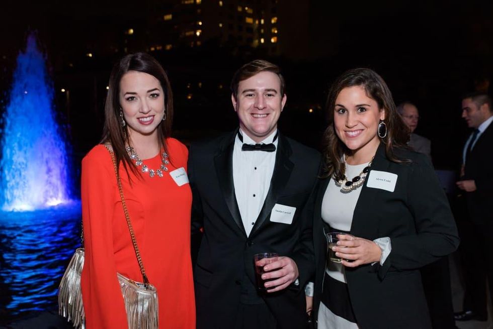 News, Houston Young Lawyers, holiday party, Dec. 2016. Erin Mitchell, Austin Carswell, Alyssa Ladd