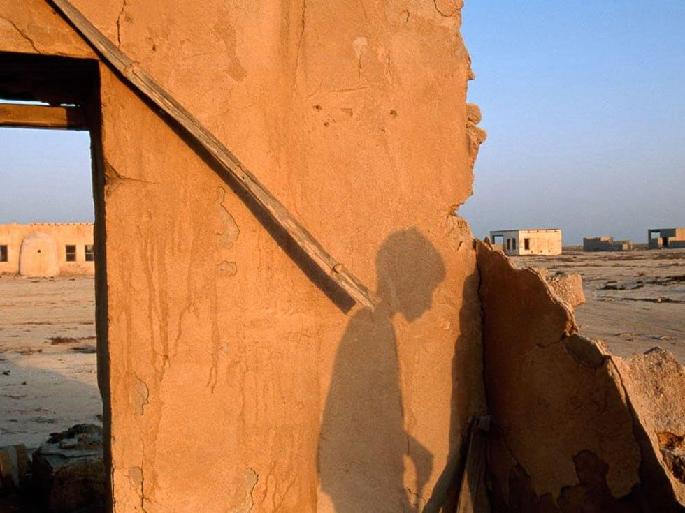 News_Katie Oxford_Fire_Jan. 2010_Robb Kendrick_shadow boy_National Geographic