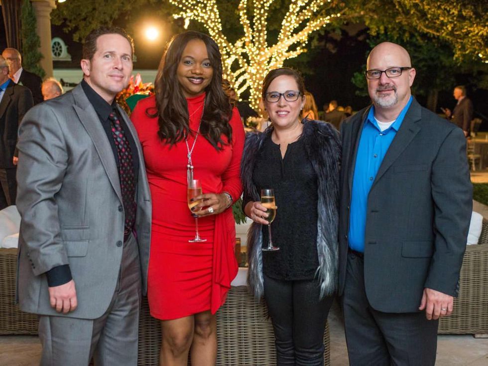 News, MD Anderson Santa's Elves, Dec. 2015, Shaun Sylvester, Tiffany Sylvester, Merideth Miller, Andy Miller
