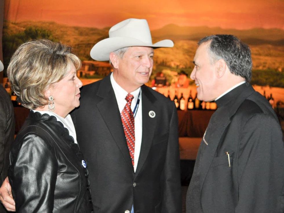 News_Rodeo Wine Auction_March 2010_Paula Robinson_Charles "Butch" Robinson_Cardinal Daniel DiNardo
