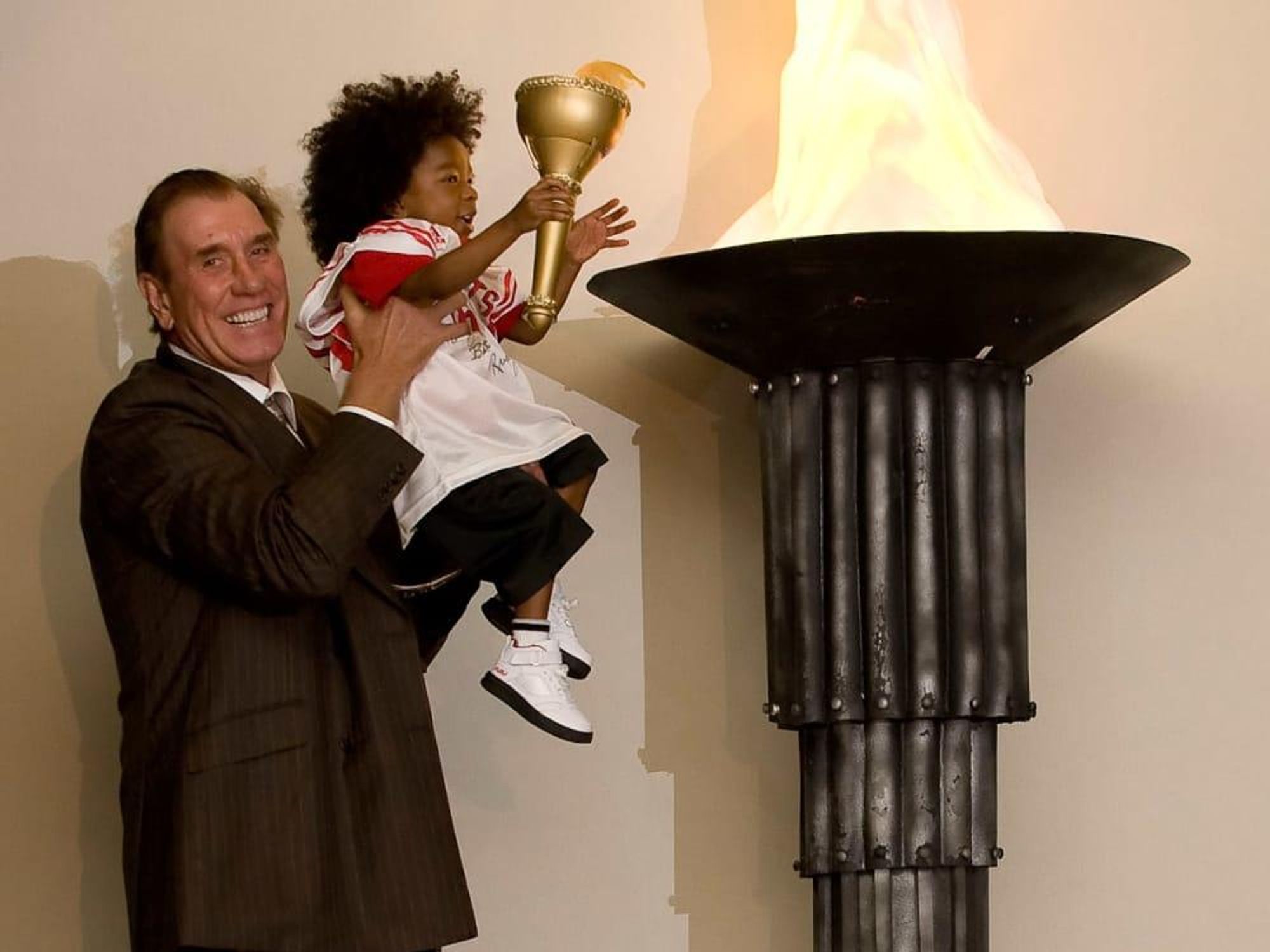 News-Surprises-Rudy Tomjanovich and Jessiah Williams Celebration of Champions