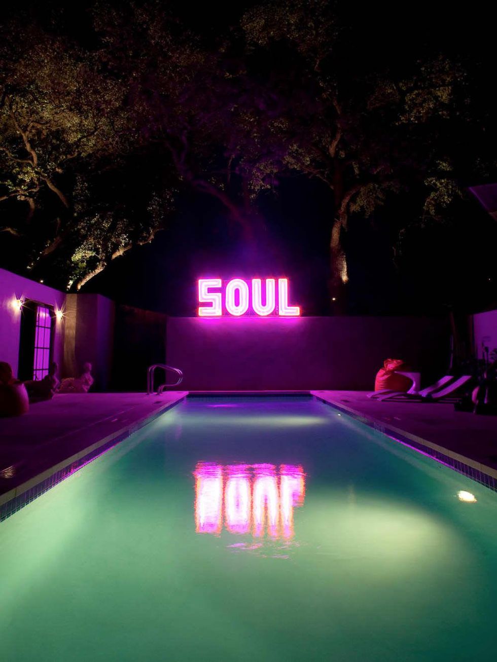 News_Travel_Lonnie Schiller_Hotel Saint Cecilia_pool_neon sign
