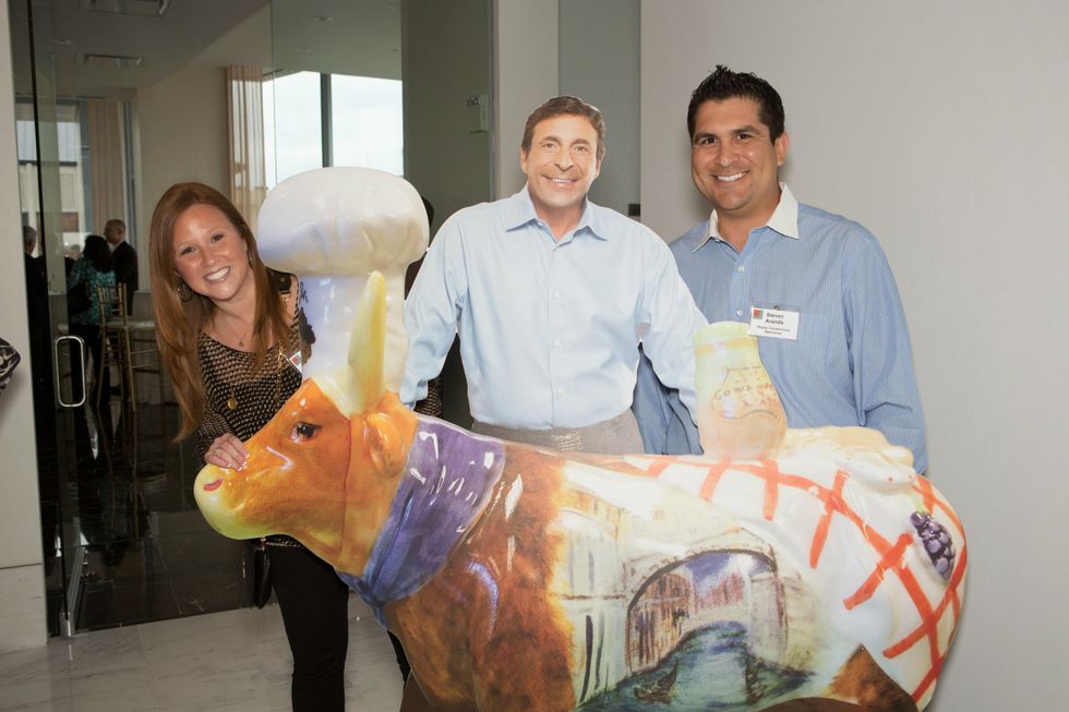 News, Upper Kirby Game Changer, Karla and Steve Aranda with the Johnny and "Cow'rrabba, April 2014