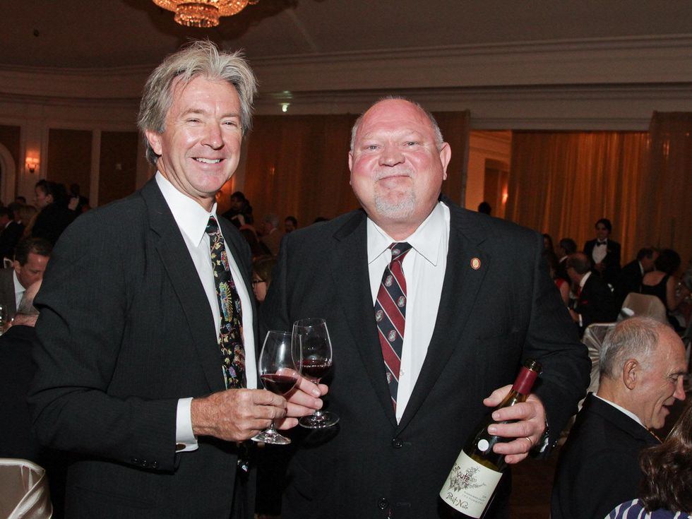 Norm Spalding, left, and Guy Stout at the Best Cellars dinner.