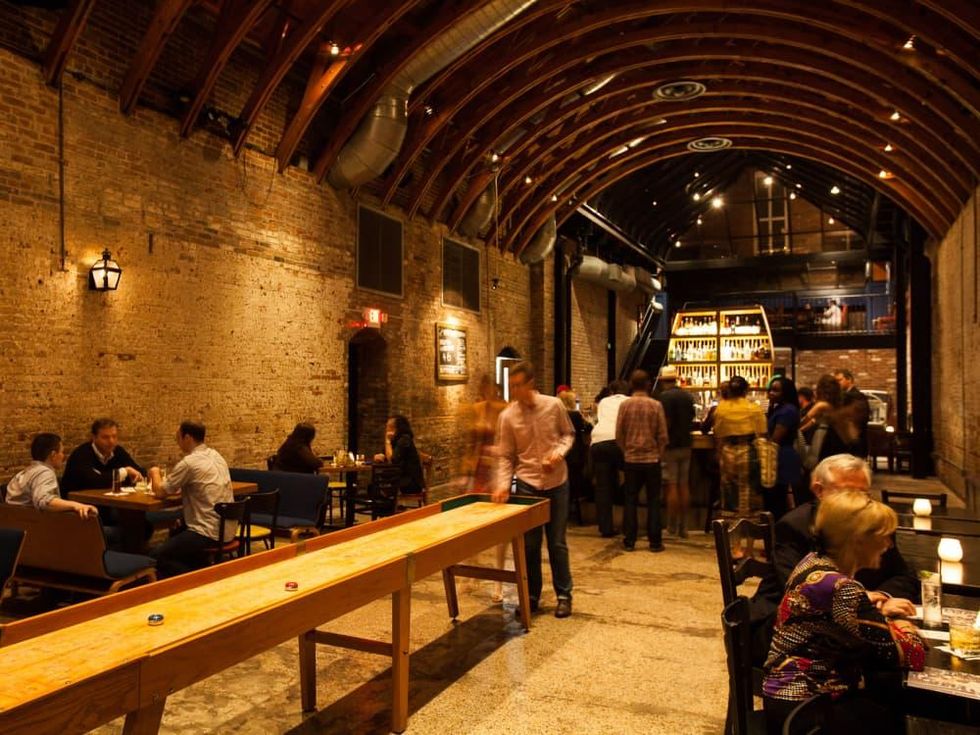 OKRA Charity Saloon bar with customers