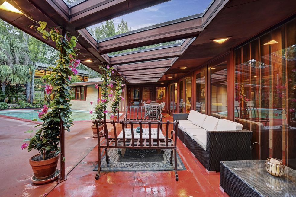 On the Market 12020 Tall Oaks St. Frank Lloyd Wright house July 2014 patio