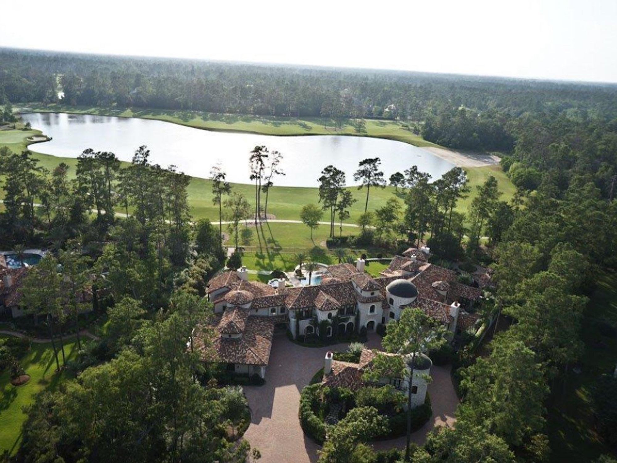 On the Market 15 Grand Regency Circle Enron mansion The Woodlands January 2015 back aerial