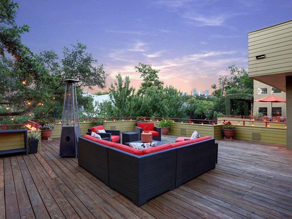 On the Market 2603 Hopkins St. September 2014 deck with skyline view