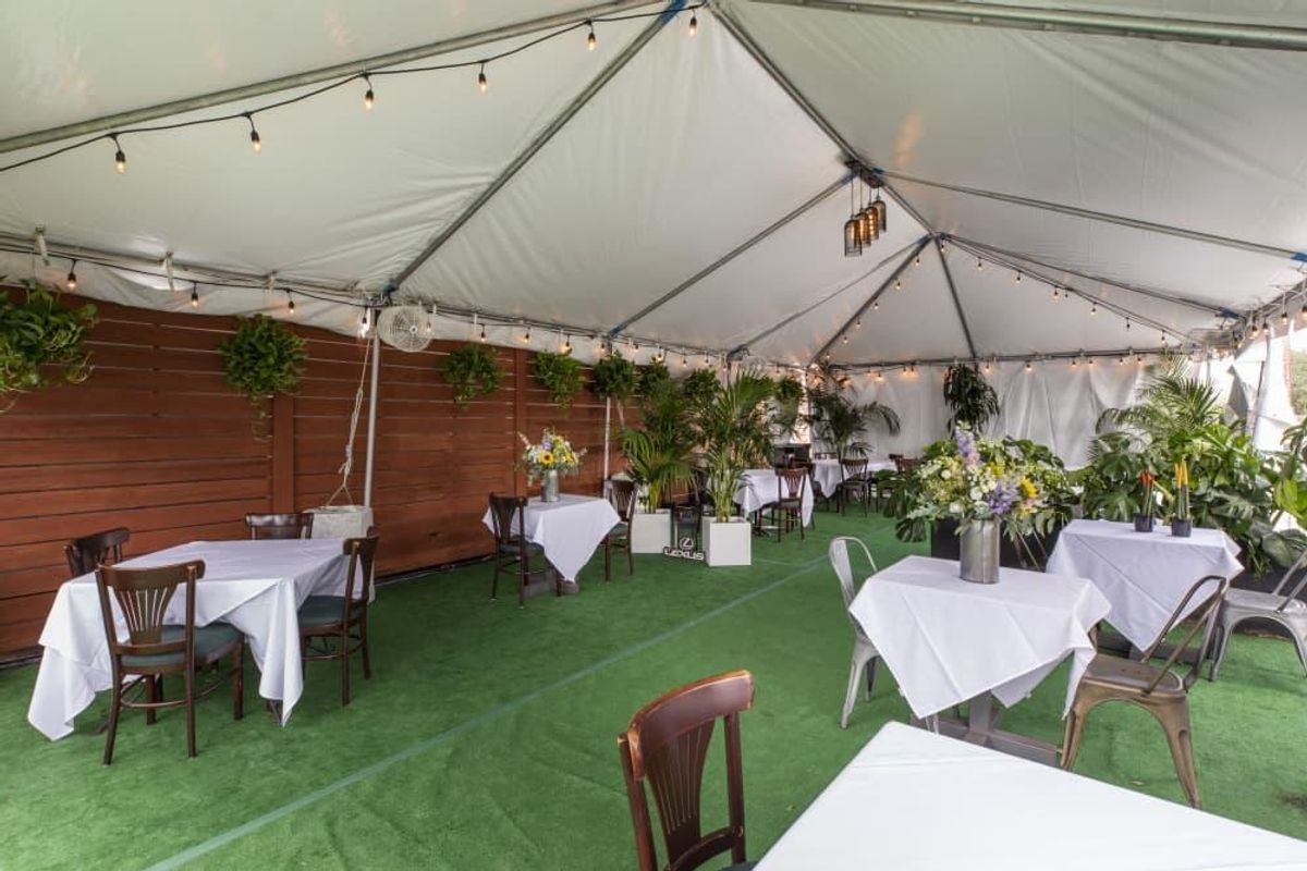 Wines are halfoff on One Fifth's Lexus patio. CultureMap Houston