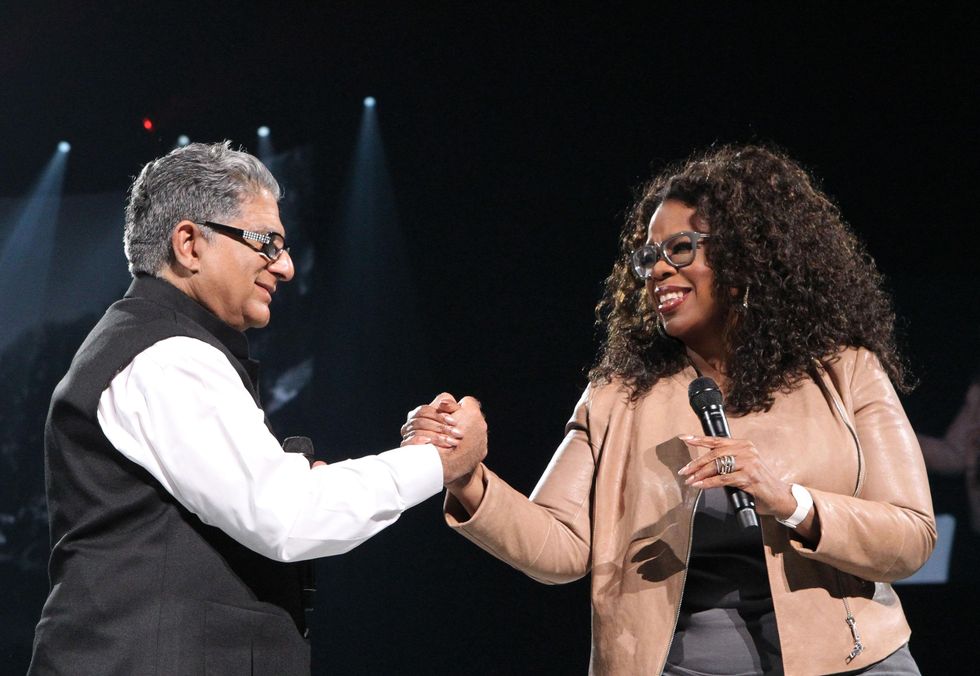 Oprah\u2005Winfrey\u2005with\u2005Deepak\u2005Chopra\u2005on\u2005stage\u2005during\u2005\u201cOprah\u2019s\u2005The\u2005Life\u2005You\u2005Want\u2005Weekend\u201d