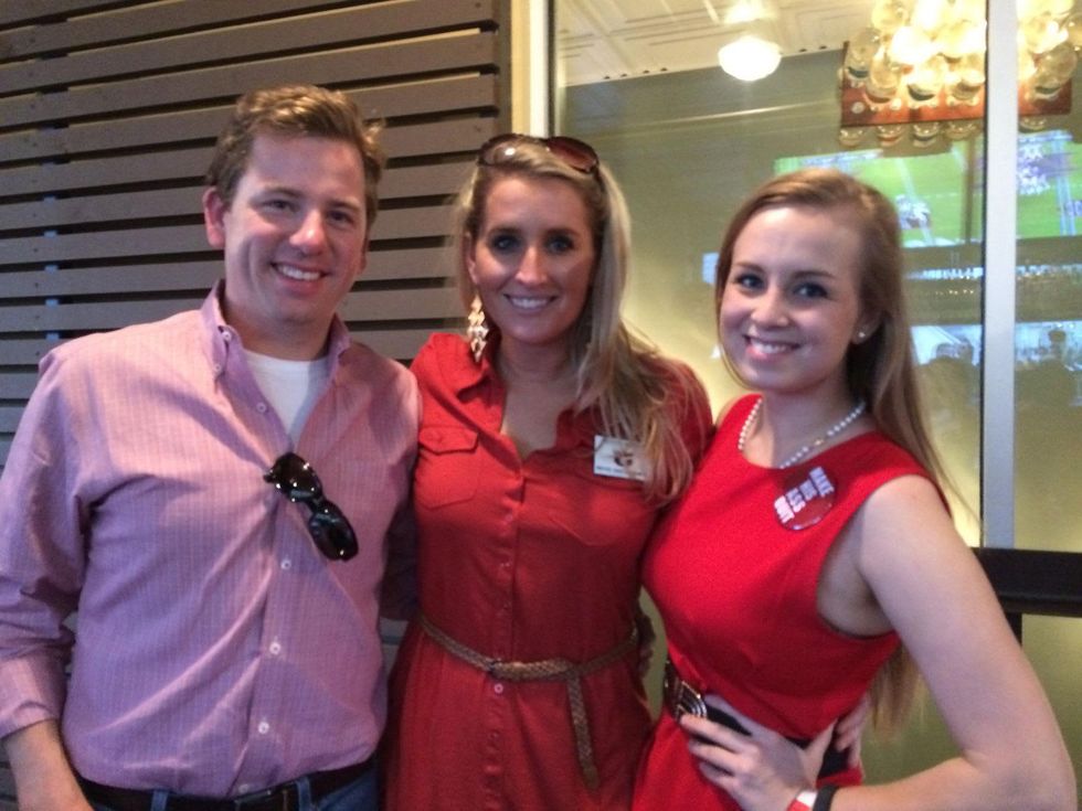 Organizers of both watch parties Jared Cox (Bama), Peyton Gregory (auburn), Christine Ellen Forgetta (Bama) at the Alabama vs. Auburn Iron Bowl Block party Houston December 2013