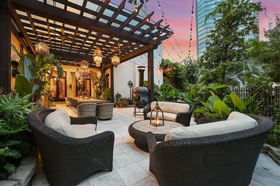 Outdoor living room space at 5007 Cedar Creek Drive