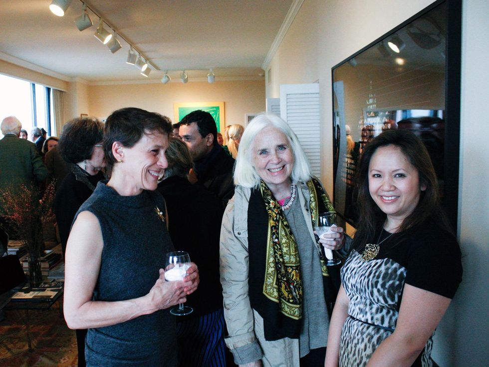 Page Kempner, from left, Fredericka Hunter and Phuong Tranvan at Slavka Glaser's FotoFest reception March 2014