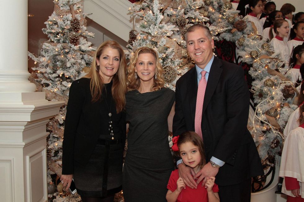 Paige Fertitta, from left, Courtney Hill Fertitta, Ella Fertitta and Jason Fertitta at the 9th Annual Santa's Elves Event December 2014