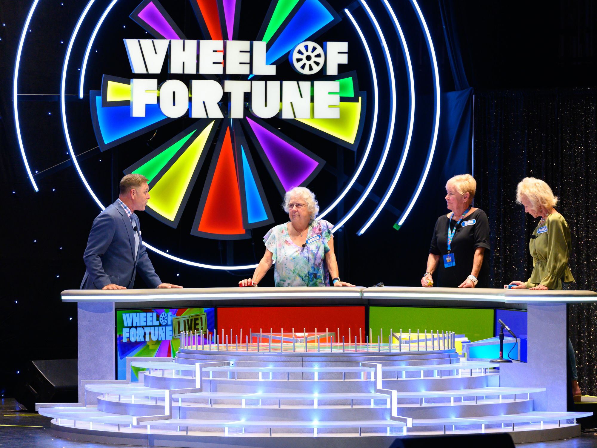 https://houston.culturemap.com/media-library/participants-on-wheel-of-fortune-live.jpg?id=32096402&width=2000&height=1500&quality=85&coordinates=269%2C0%2C406%2C0