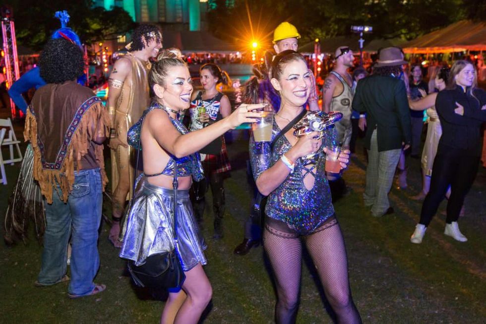 ) Partygoers danced to Calliope Musicals, who rocked the Legendary Art Car Ball stage