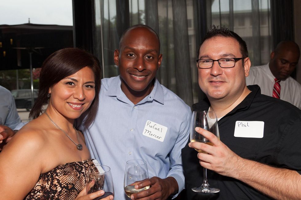 Patricia Ramirez, from left, Rafael Mercer and Phil Steuernagel at Casa de Esperanza Young Professionals party July 2014