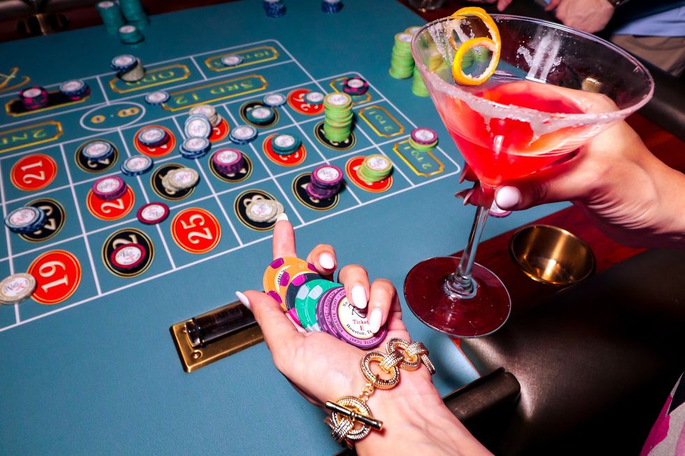 Patterson Park casino chips woman's hand