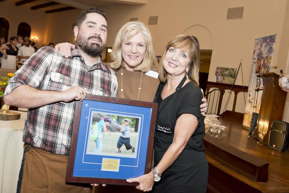 Payton and Sandy McGee, from left, with Pat Sorrells at the Camp for All event September 2014