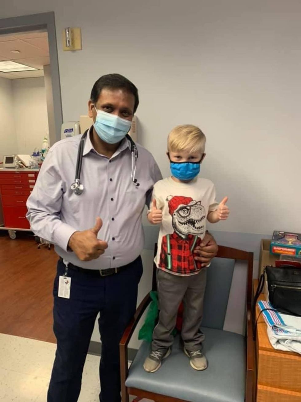 Pediatric cardiologist Avichal Aggarwal with Mason Mims