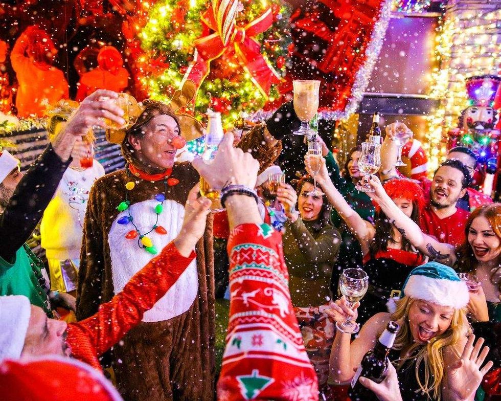 people celebrate at frosty's christmas bar