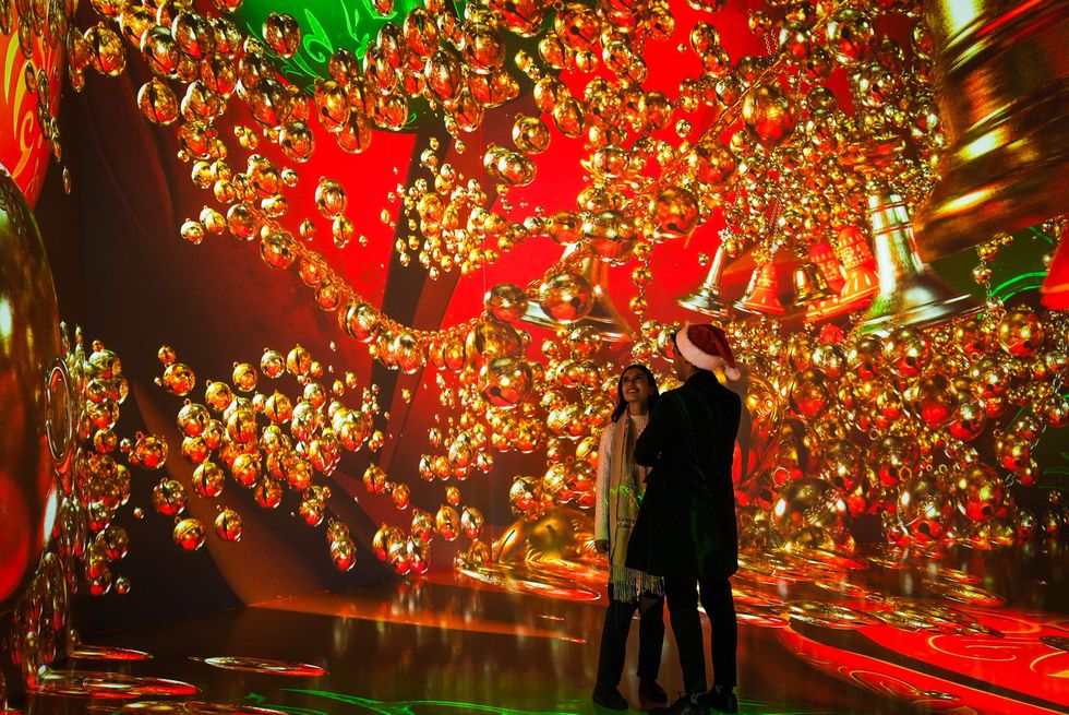 People inside Artechouse's Holiday Spectacular immersion