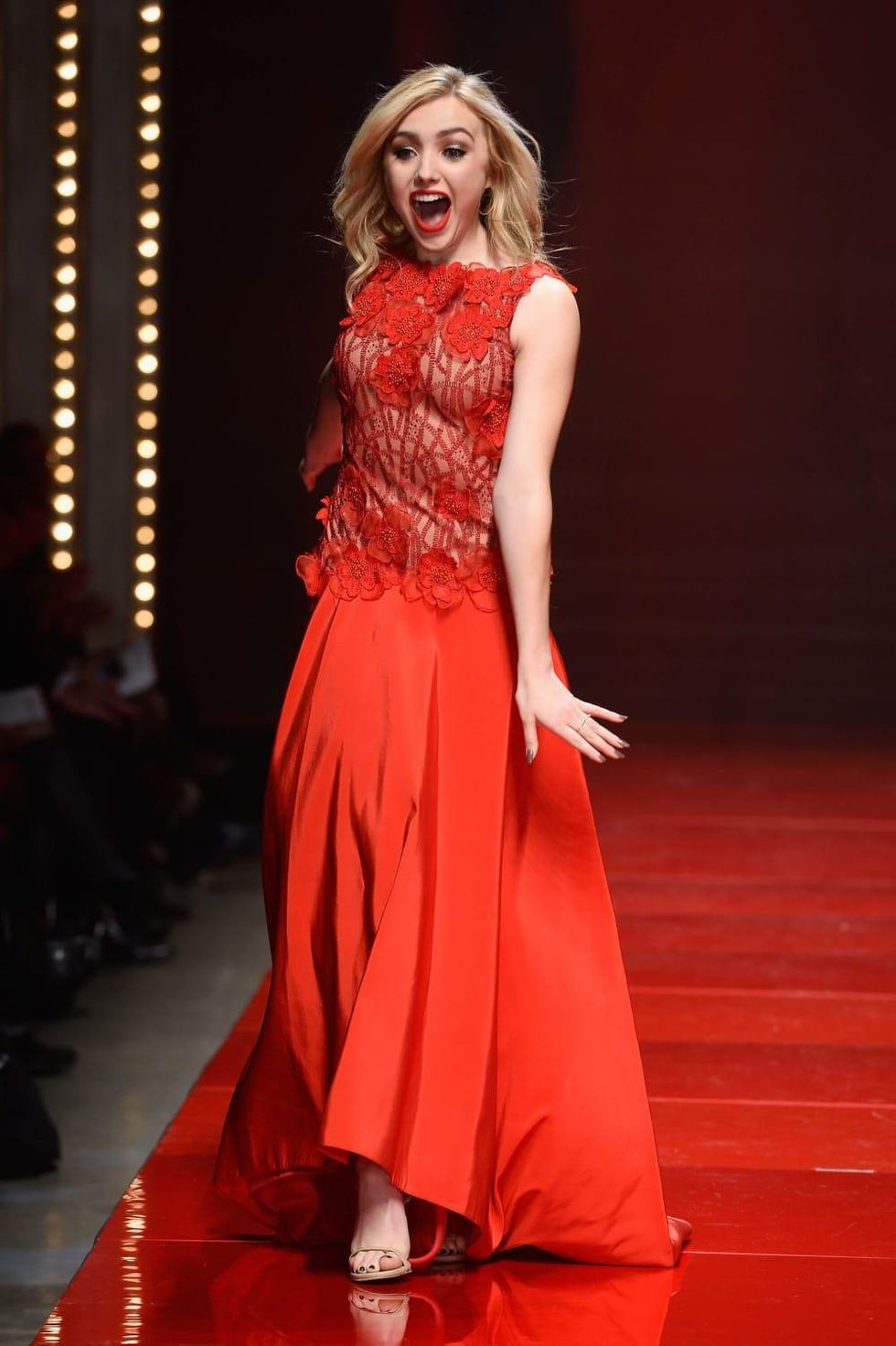 Peyton List walks the runway at the American Heart Association's Go Red For Women Red Dress Collection 2017