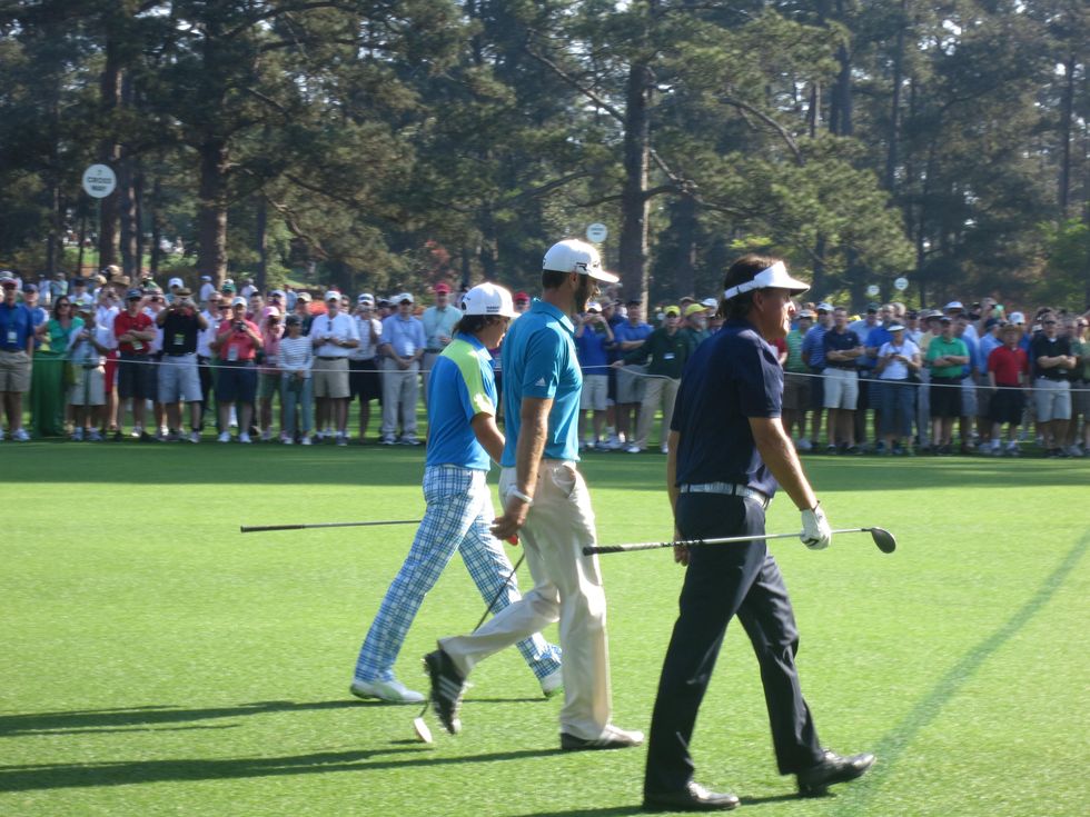 Phil Mickelson, Dustin Johnson and Ricky Fowler at Masters golf tournament April 2013