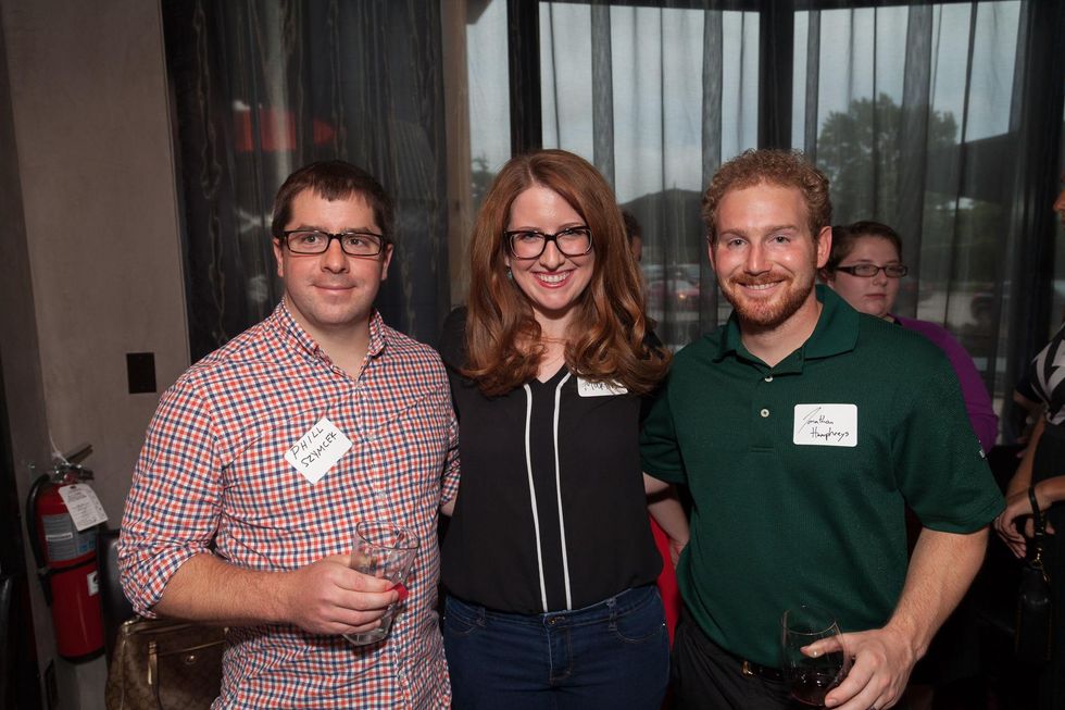 Phil Szymcer, from left, Jaclyn Martin and Jonathan Humphreys at Casa de Esperanza Young Professionals party July 2014