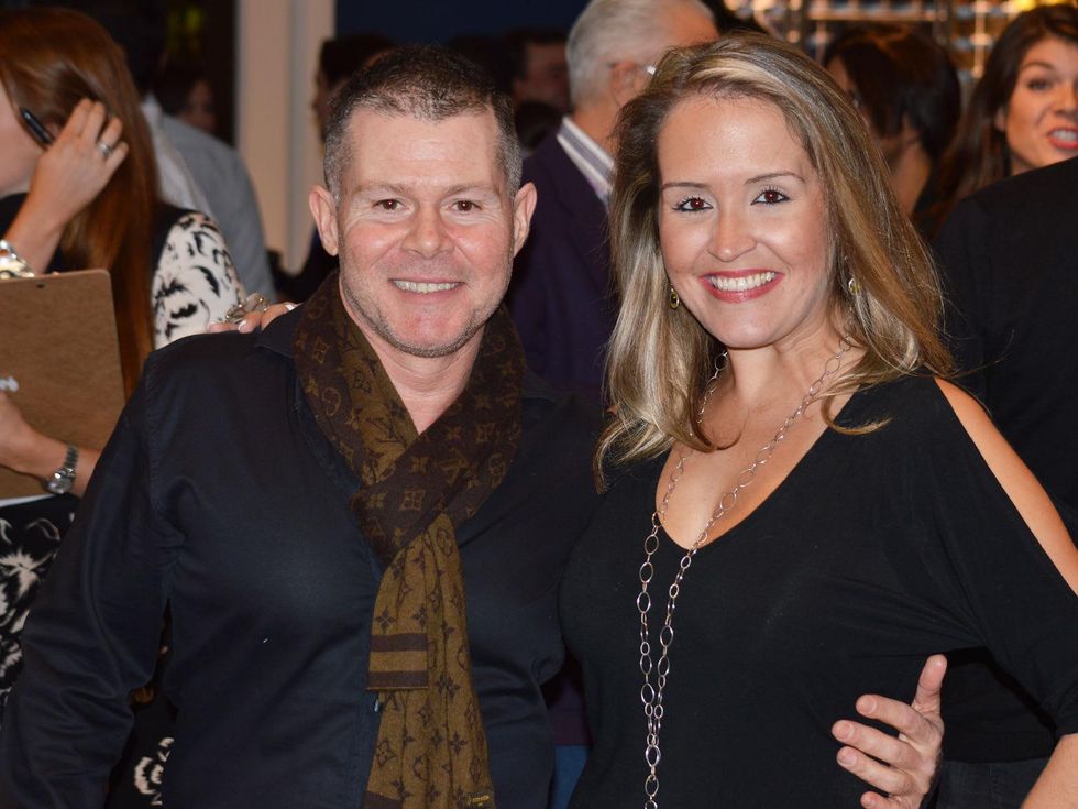 Philipe Licausi and Nicole Stresau at the Suitsupply Houston grand opening party December 2013