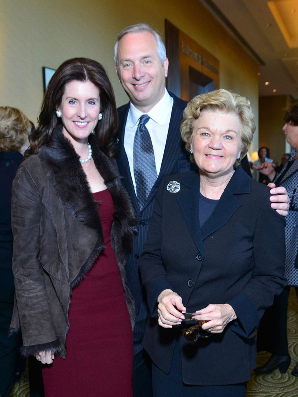 Phoebe and Bobby Tudor, from left, with Susie Glasscock at the National Philanthropy Day luncheon November 2013