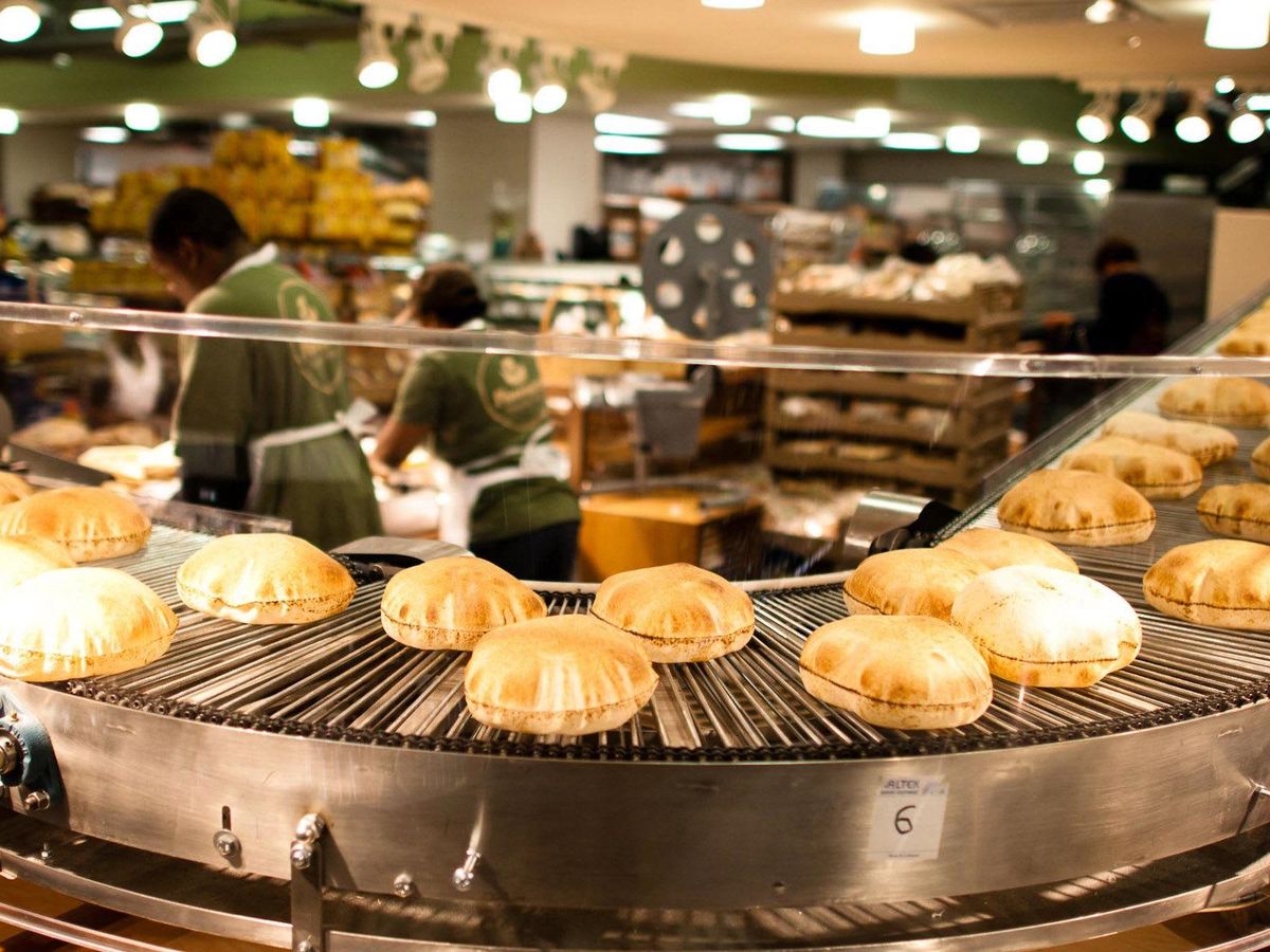 Pita bread is baked fresh daily at Phoenicia. CultureMap Houston