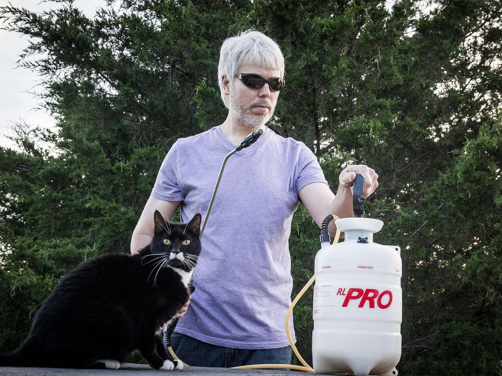 Photo of Marshall Hinsley with a pump sprayer