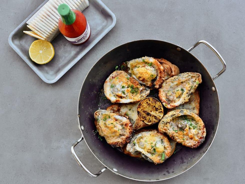 https://houston.culturemap.com/media-library/pier-6-seafood-roasted-oysters.jpg?id=31497774&width=980